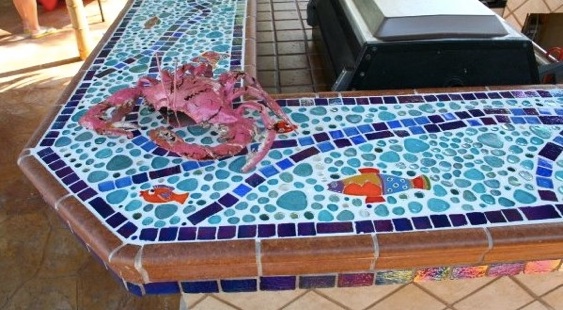 Ceramic tiles and fish for pool side bar cabana by Sherry Tolar